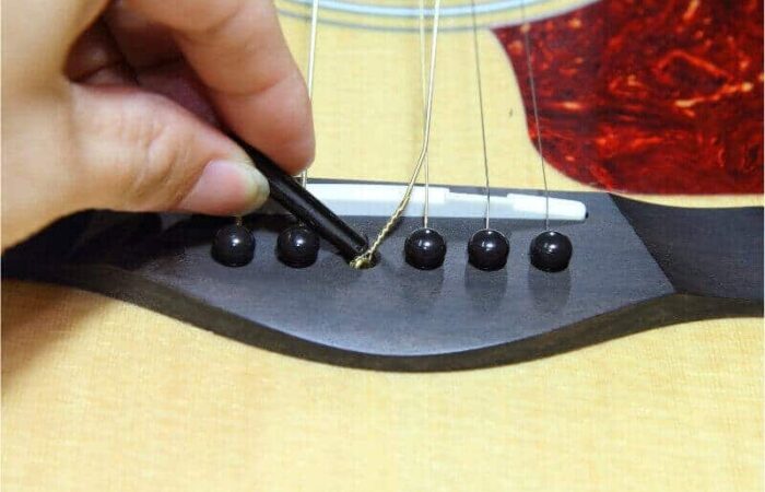 when to change guitar strings