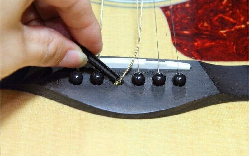 when to change guitar strings