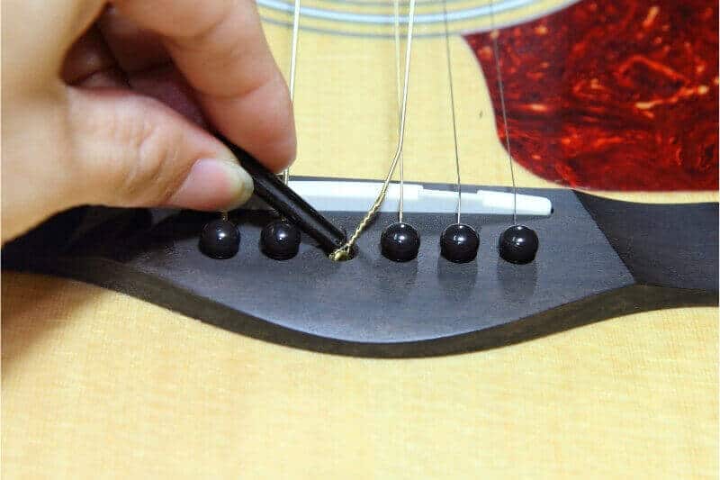 when to change guitar strings
