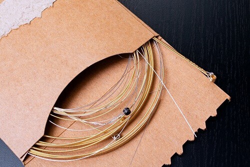 easiest acoustic guitar strings to play