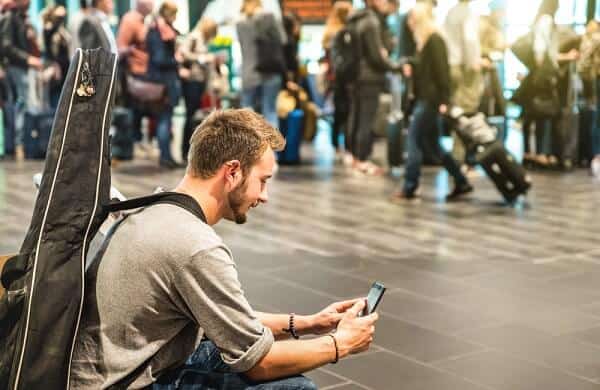 how to travel with a guitar