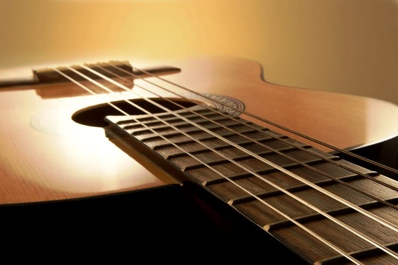 acoustic guitar action adjustment