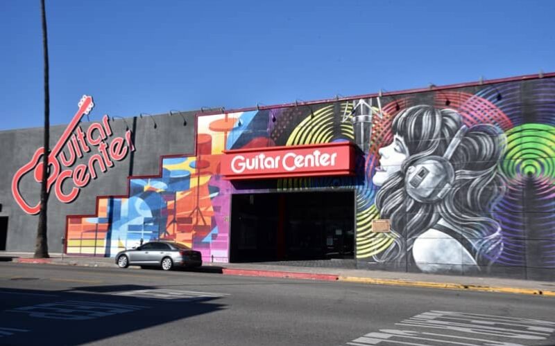 Guitar Center Buys Guitar
