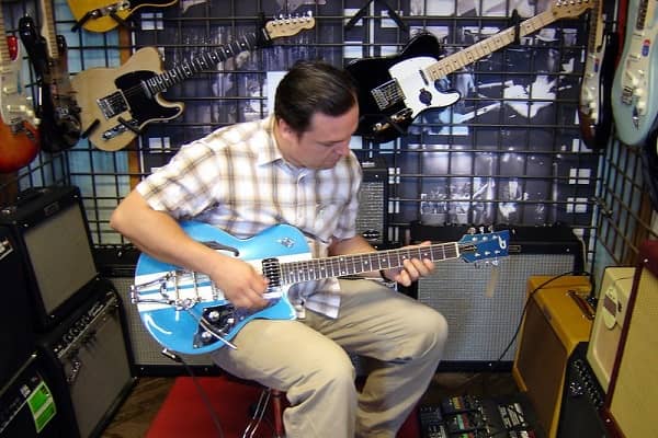 Playing A Duesenberg Guitar In A Store
