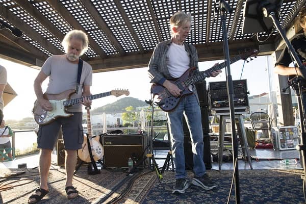 Band Members of Grateful Dead performing on a stage