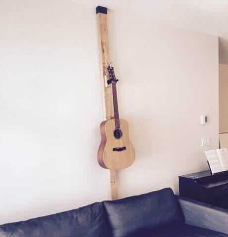 Hanging guitar without drilling and without screws  